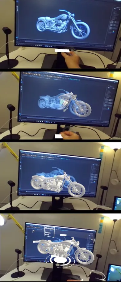 Figure 3: Deme 2: pulling a 3D model
from a computer display